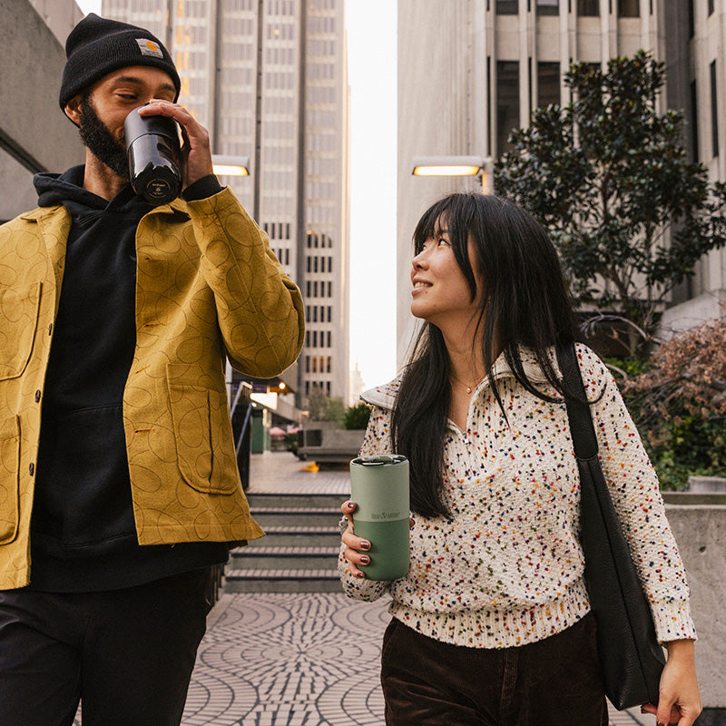 bring-your-own-party-kit-pints-and-tumblers-a1 16oz_rise_tumbler_black_iceberg_couple_drink_city_street_square.jpg