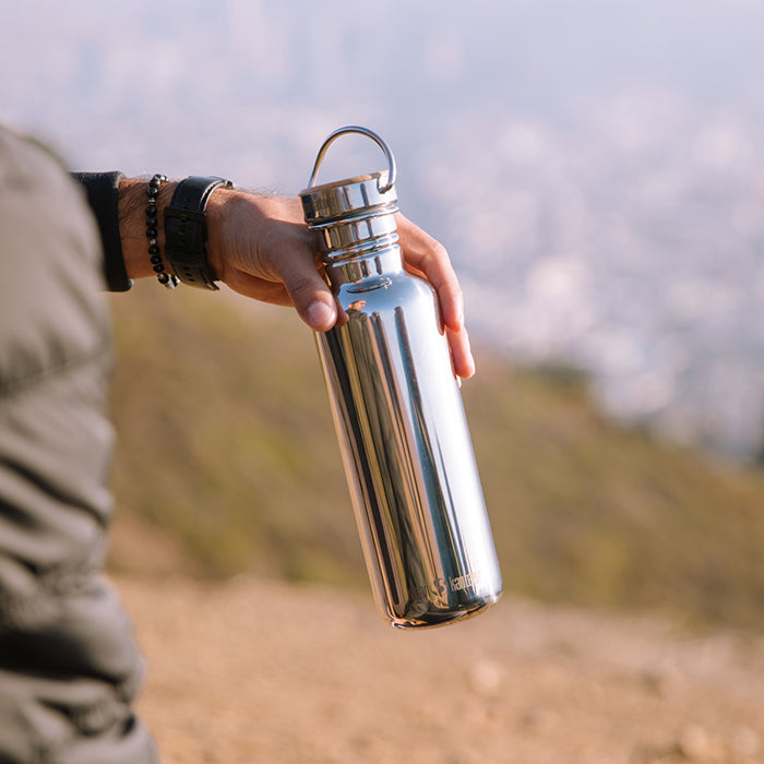 27oz-reflect-with-bamboo-cap-l0 K27SSLRF-MS-BAMBOO_reflect_bottle_hand_lifestyle.jpg
