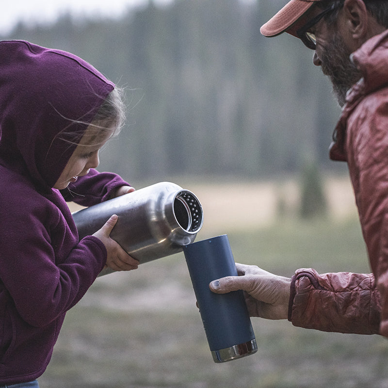 64oz-tkwide-with-loop-cap-u3 tkwide_64oz_bottle_girl_dad_filling_square.jpg